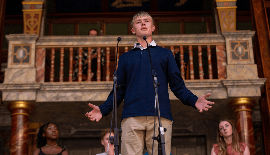 A boy reciting poetry
